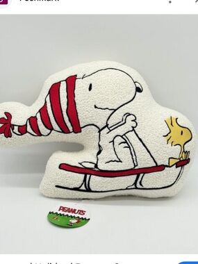 Peanuts Decorative Sherpa Pillow - White with Green Tag Accent